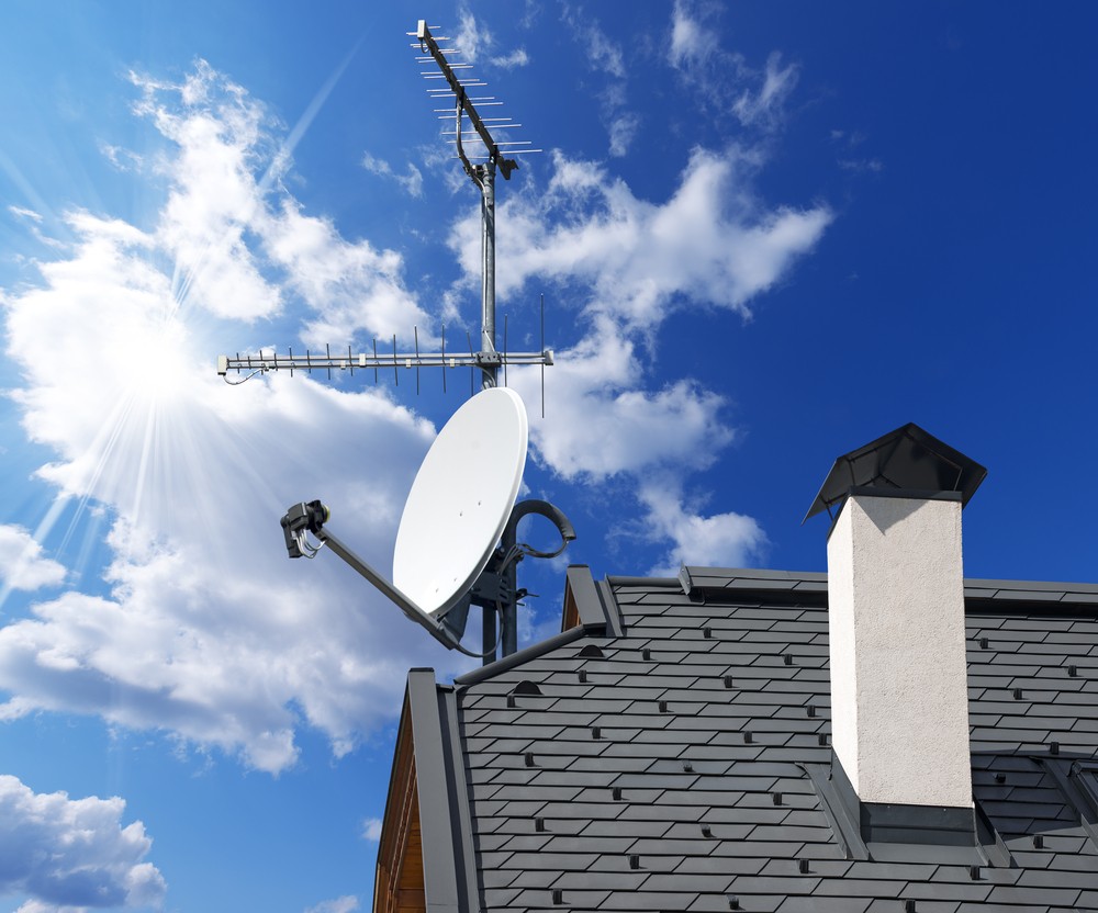 satellite dish and antenna tv on blue sky / satellite