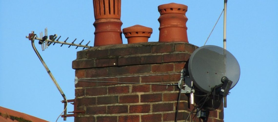 a,typical,chimney,found,on,a,domestic,semi,detached,dwelling